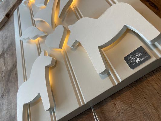 Vit på Leksandsgreige bakgrund