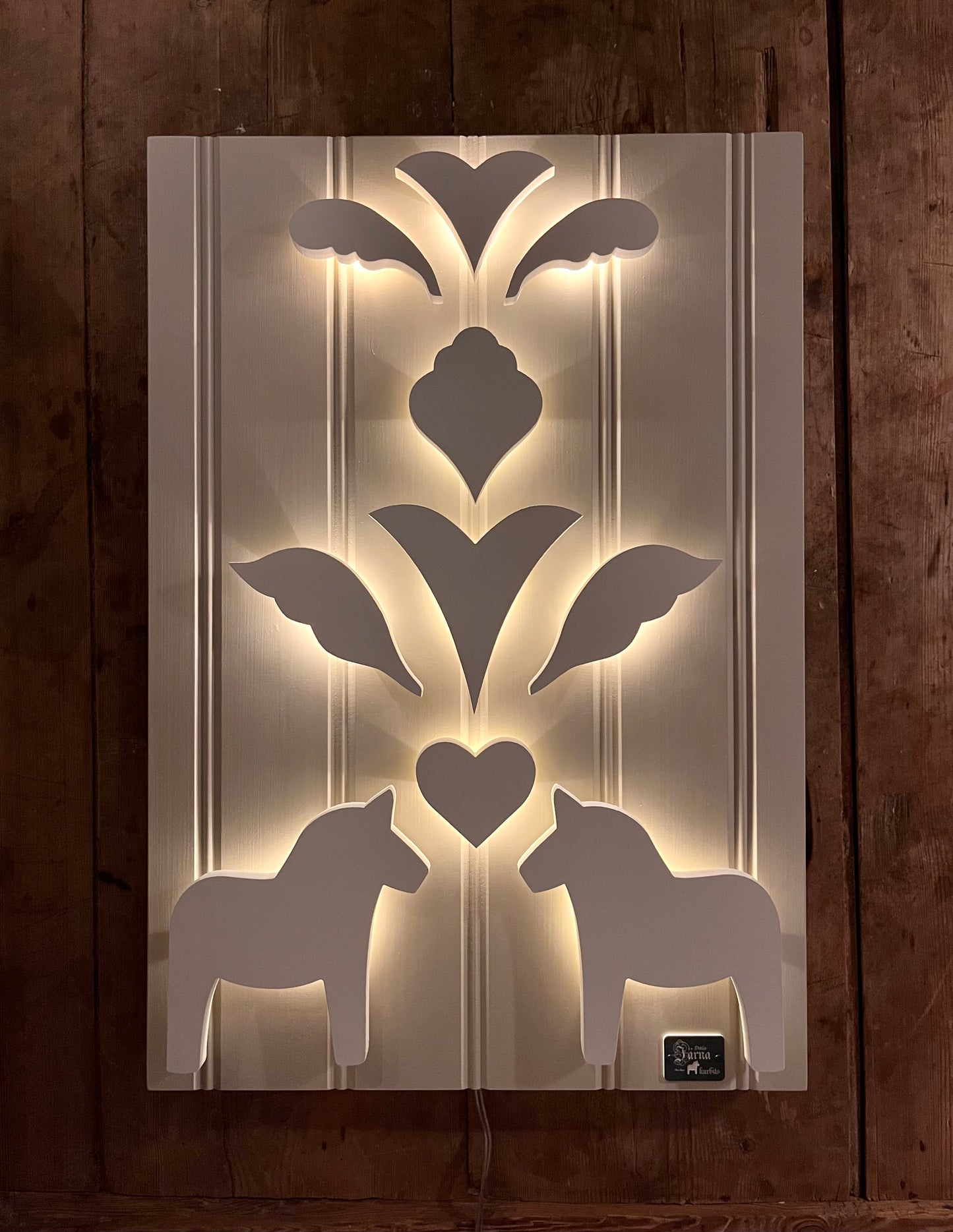 Vit på Leksandsgreige bakgrund