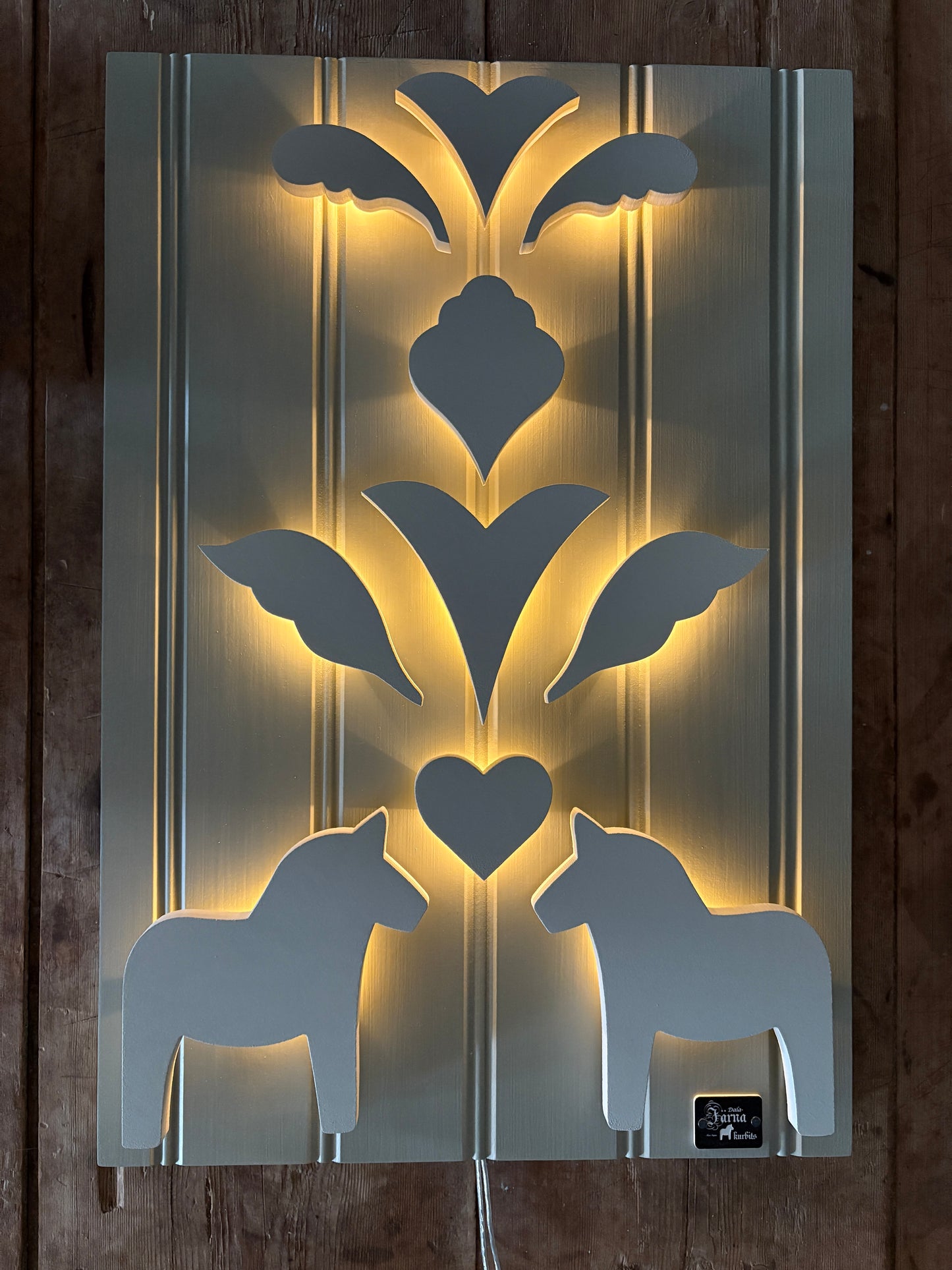 Leksandsgreige på Beige-grå-grön bakgrund