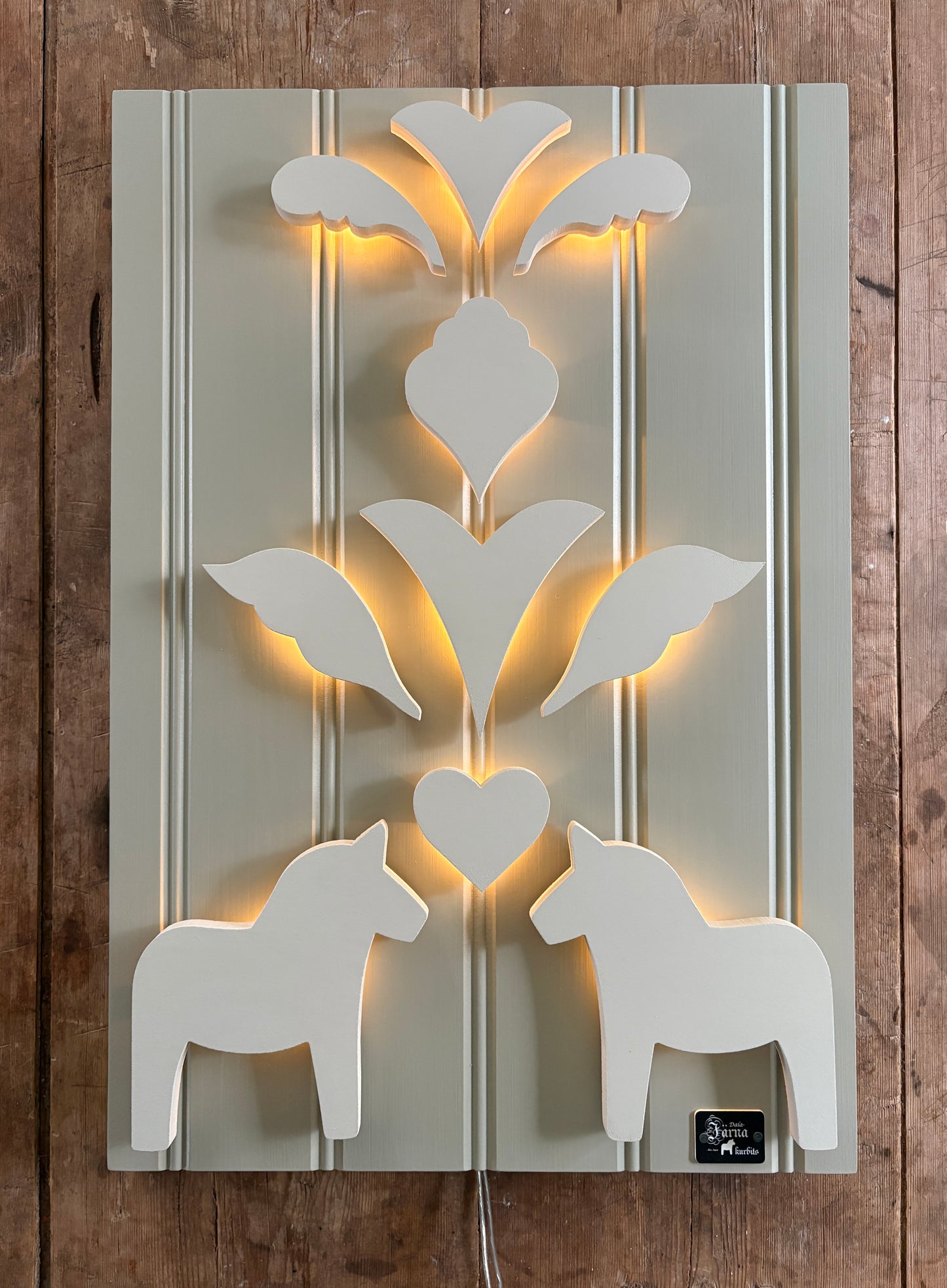 Leksandsgreige på Beige-grå-grön bakgrund